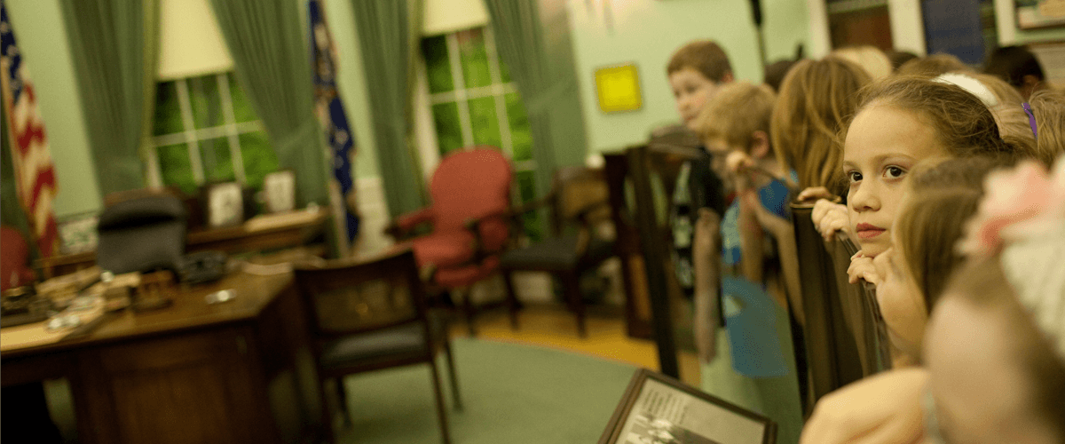 Students viewing oval office