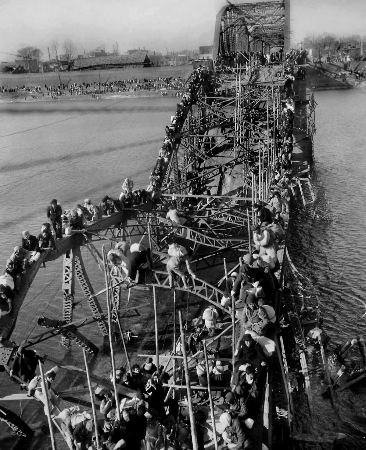 North Korean Bridge with people escaping