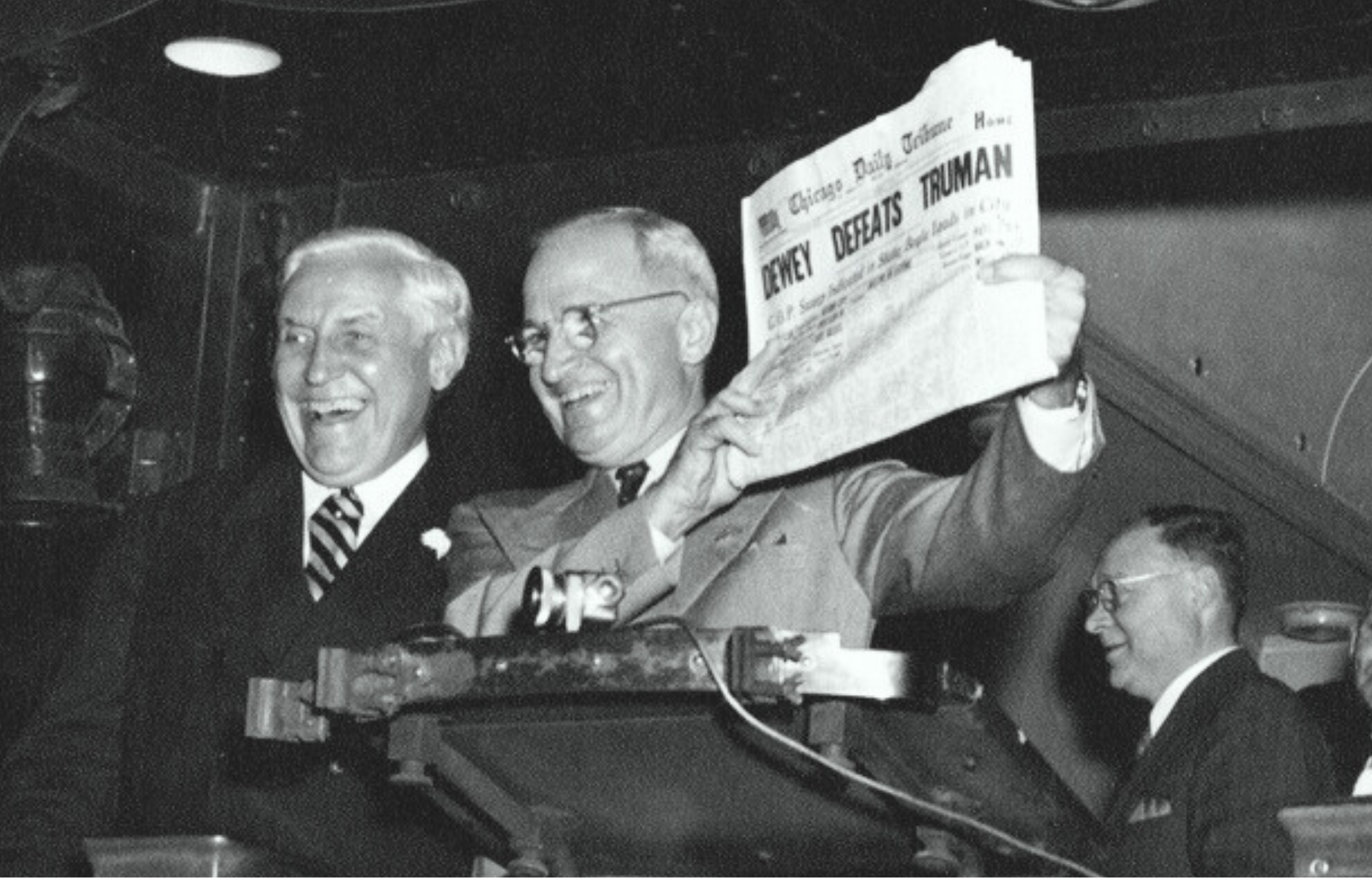 At St. Louis Union Station, postmaster Bernard Dickmann (left) stands next to newly elected President Truman as he holds up the famous Chicago Tribune newspaper headline "Dewey Defeats Truman" (November 4, 1948). Courtesy Truman Library, photo 64-861